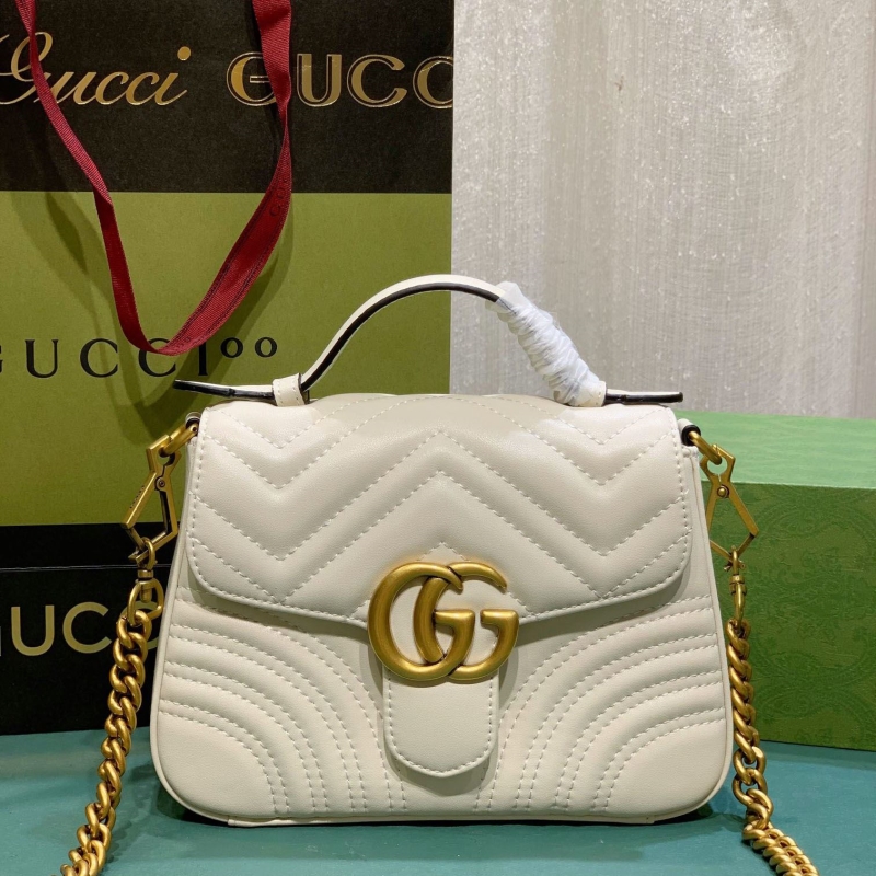 G*u*i top handle bags
